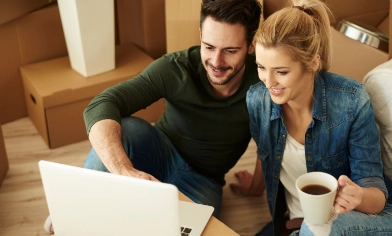 couple looking at laptop