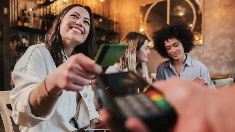 lady making a payment with her card