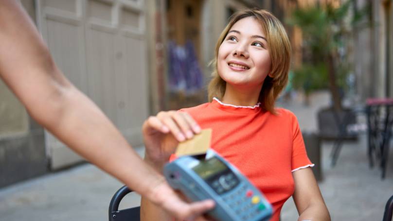 lady making a payment using her card