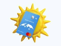 a post office travel money card on a yellow inflatable sun