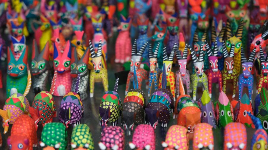 A large group of brightly coloured animal figurines