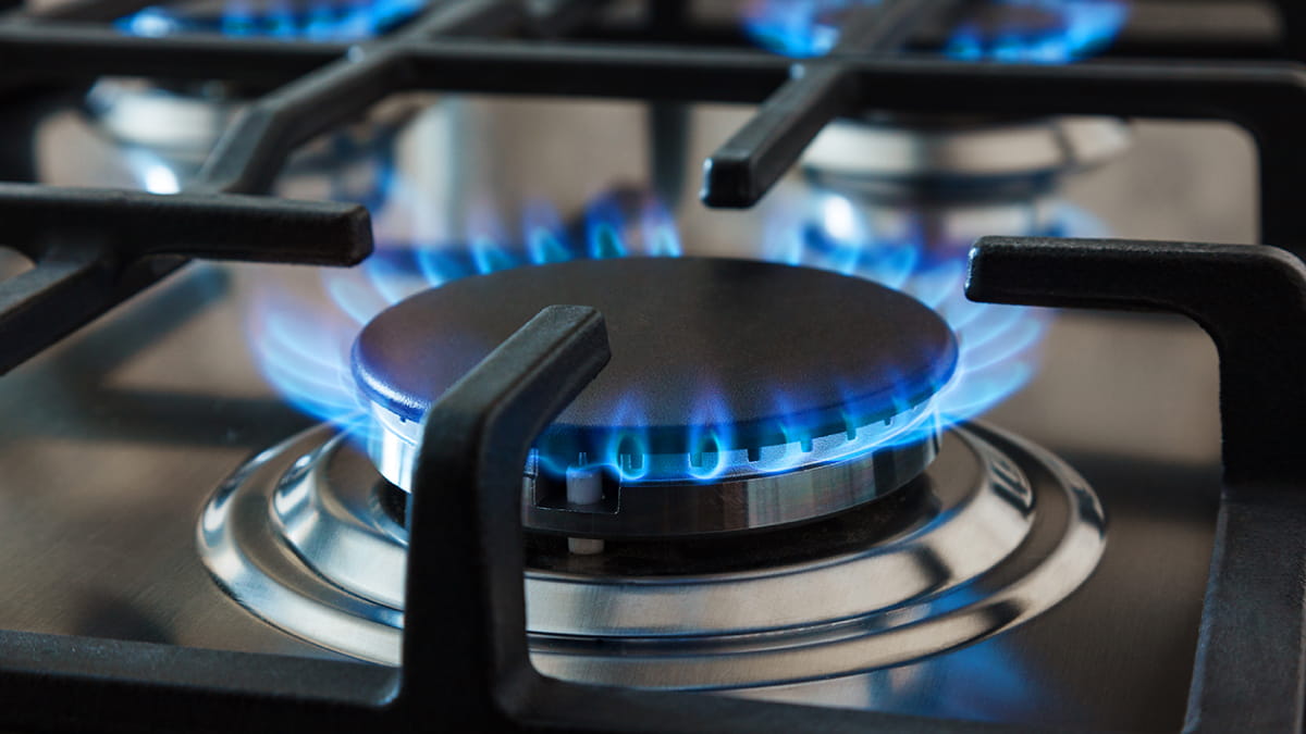 Close up of the flames on gas cooker hob