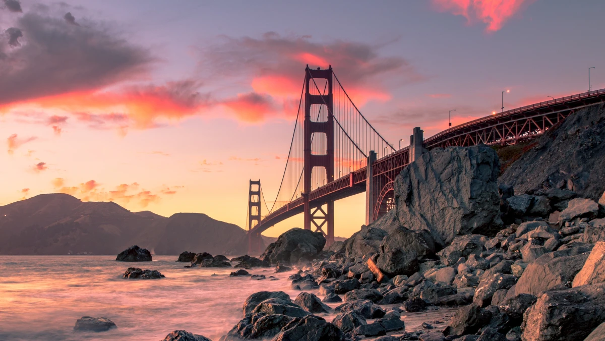 fiery clouds of sunset over the span of the Golden Gate bride in San Francisco California, USA
