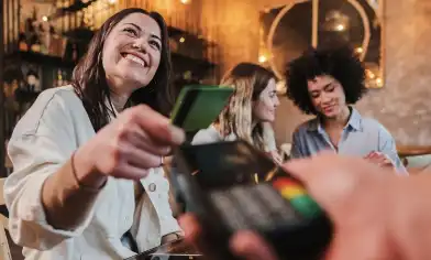 lady making a payment with her card