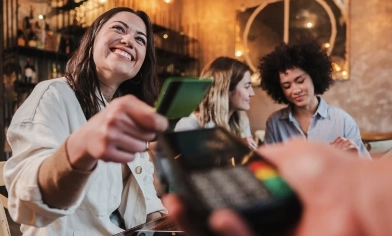lady making a payment with her card
